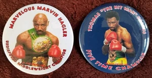 (2) 1997 I. M. Exclusive Boxing Marvin Hagler & Thomas Hearns Button Pins - Picture 1 of 3