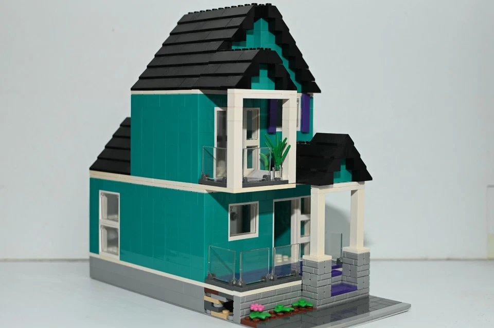 Casa de Ladrillos Turquesa Oscuro Modular Ciudad Modelo Personalizado Construido con Ladrillos Foto 1 de 4
