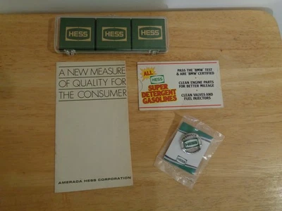 HESS OIL COMPANY 4 PIECE LOT CANDY CHAMPION PIN GASOLINE BROCHURE MILEAGE CARD - Image 1 of 4