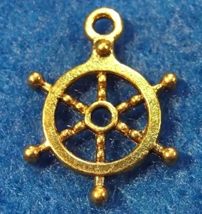 50Pcs. WHOLESALE Tibetan Antique Gold 3D Ship's WHEEL Helm Charms Q0001 - Picture 1 of 3