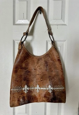 Bolso de mano de cuero Raviani con pedrería Fleur De Lis y forro de guepardo púrpura Foto 1 de 4