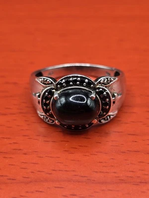 Anillo de plata esterlina estrella negra zafiro y ónix para hombre con cruces en el lateral Foto 1 de 4