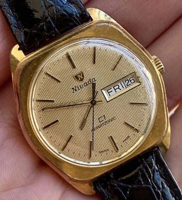 ✅ Reloj NIVADA - Caja y esfera dorada - Día/Fecha Cuarzo SUIZO ✅ Foto 1 de 4