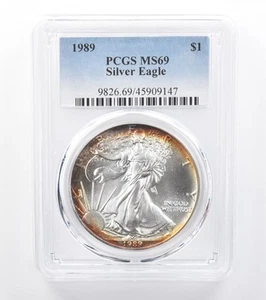 1989 American Silver Eagle MS69 PCGS Red/Yellow Peripheral Tone *7762 - Picture 1 of 3