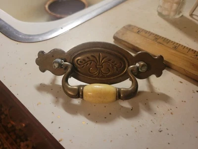 Vintage 1 Brass Hardware Drawer Pull With Beige Ceramic Center Bead  - Image 1 of 3