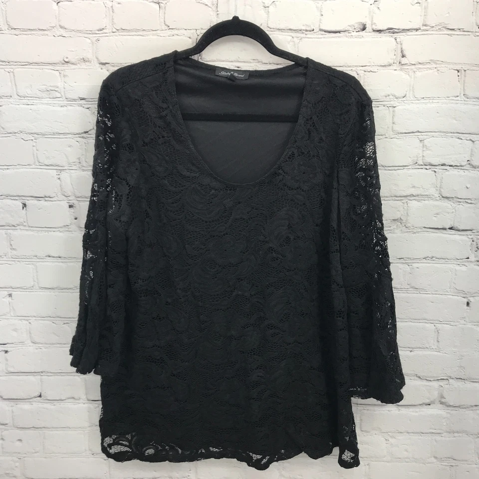 Top de mujer marca Slinky 1X suéter de encaje negro forrado acampanado manga corta transparente Foto 1 de 4