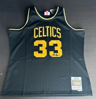 Larry Bird Signed Celtics Black & Gold Mitchell & Ness Jersey PSA 2C64409 - Image 1 of 3