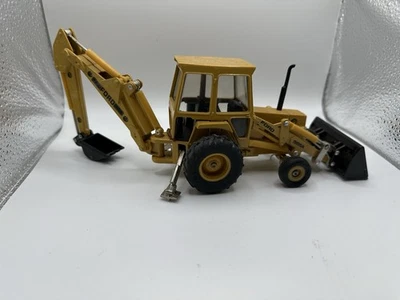 Retroexcavadora retroexcavadora Ertl Ford 555A 1/32 juguete de construcción fundido a presión Foto 1 de 2