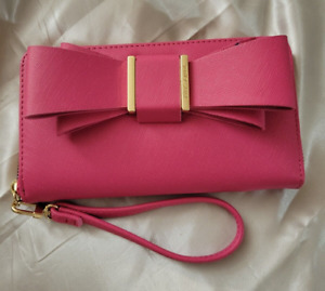 Betsey Johnson Pink zip around wristlet with bow