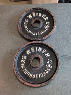 Weider International PAR de placas olímpicas de 10 kg 22 lb Peso de colección 44 lb total Foto 1 de 4