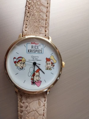 RELOJ KELLOGG'S ARROZ KRISPIES CORREA DE CUERO TOSTADO NUNCA USADO NECESITA BATERÍA Foto 1 de 4