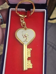 Cased Gold Plated Commemrative Key Ring Olympic Games Seoul 1988 - Picture 1 of 6