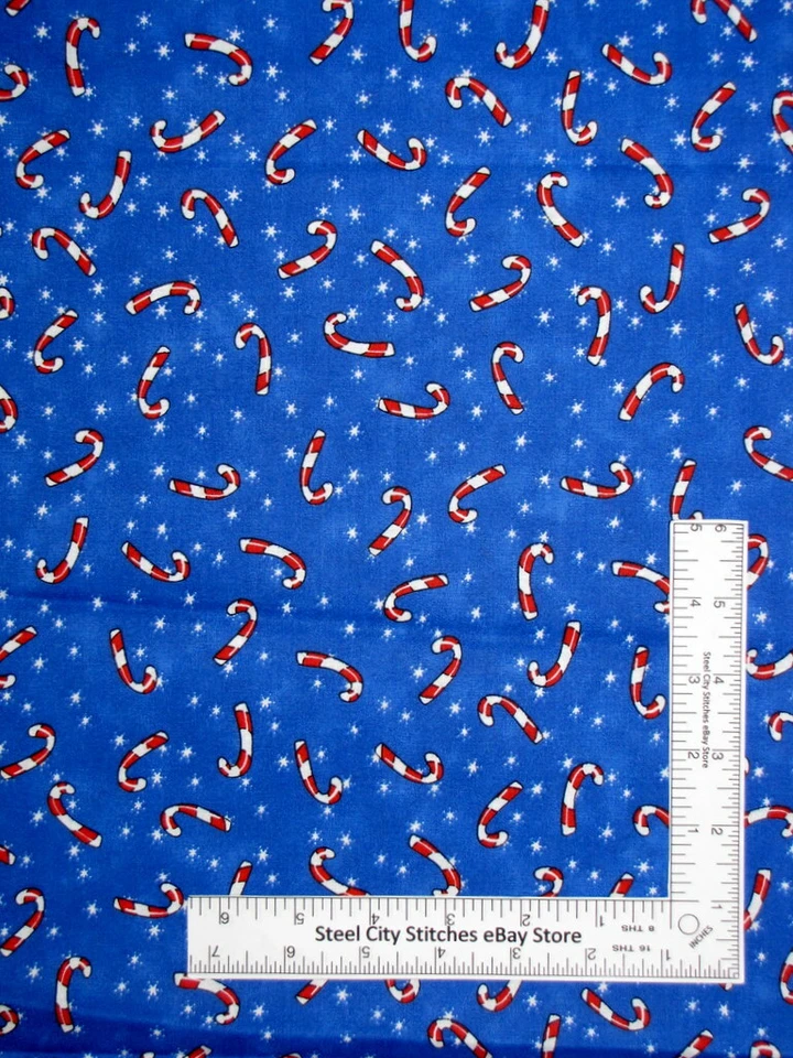 Bastón de caramelo de Navidad lanzamiento de estrellas azul tonal tela de algodón Santee 25" de largo Foto 1 de 1