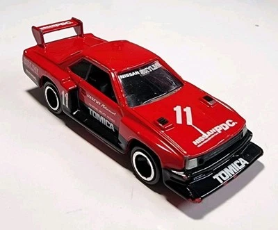 Tomica Tomy #65 Red Nissan Skyline Silhouette Formula 1/68 Diecast/Plastic - Image 1 of 4
