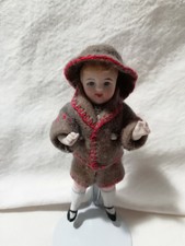 Small ANTIQUE DOLL with felt suit and charming hat