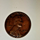 1961 Lincoln Penny.  NMM. Error On The "L" In Liberty.Defect near Lincoln's nose