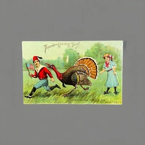 Thanksgiving Postcard Large Turkey Bird Chasing Boy Waving the American Flag - Picture 1 of 4