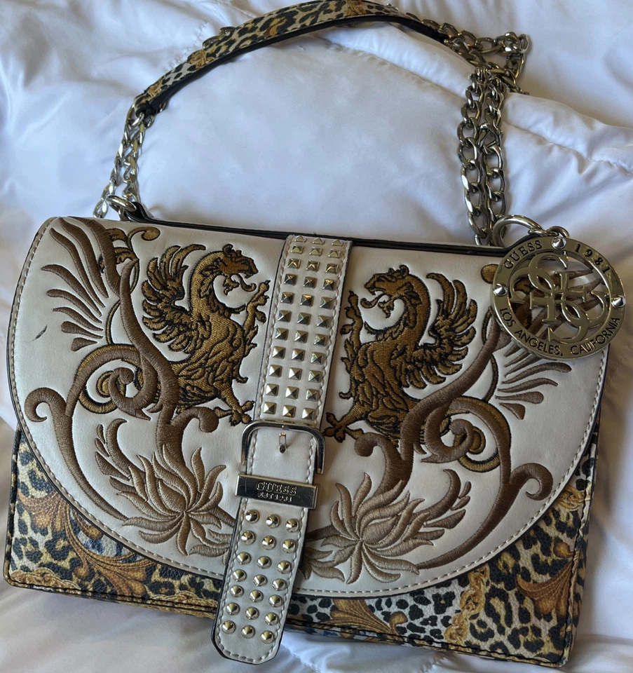 Super Único - Doble Grifo!!!!!Cartera Guess con correa de cadena! Foto 1 de 4