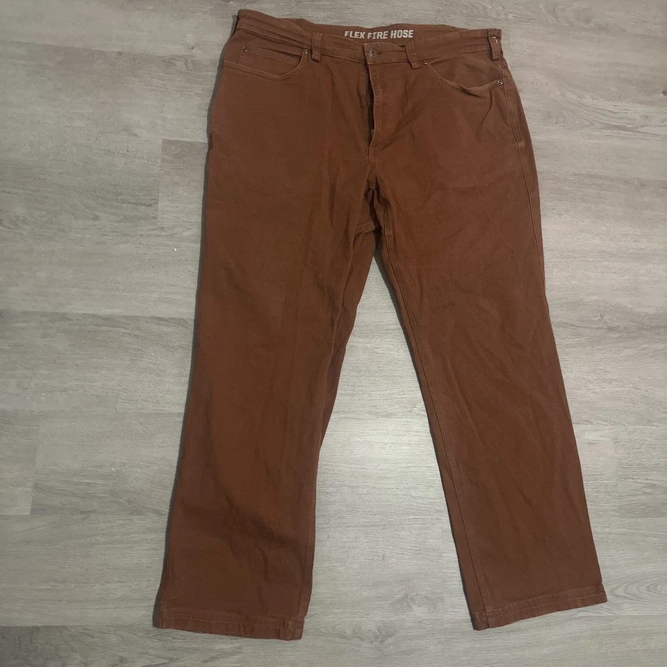 Pantalones comerciales Duluth para hombre 38x30 manguera flexible contra incendios para hombre ajuste relajado naranja utilitario Foto 1 de 4