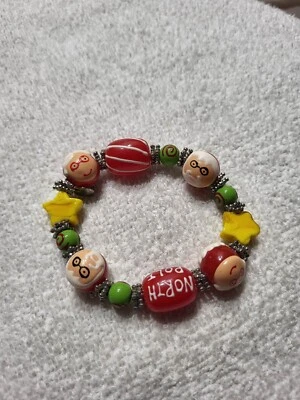 Santa & grandma Christmas star yellow green red glass beads stretch bracelet - Image 1 of 4