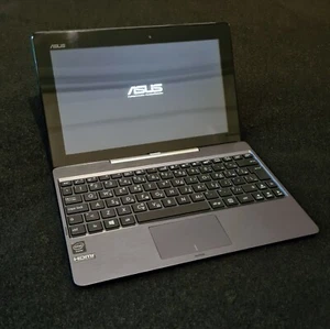 ASUS T100TA 2 IN 1 TOUCHSCREEN 10.1" COMPUTER PORTATILE ATOM 1.33GHz 2GB RAM 30GB SSD - Foto 1 di 12