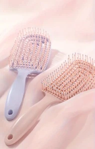 Haarbürste ohne Ziepen für Damen, Herren & Kinder - Entwirrbürste Rosa oder Lila - Bild 1 von 10