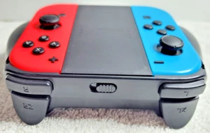 OEM Pair Nintendo Switch Joy-Con Blue & Red Set Controllers w/ Grip Works! - Picture 1 of 6