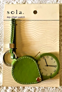 S342 - NUEVO con ETIQUETA - S o l a. - RELOJ LLAVERO VERDE - Imagen 1 de 5