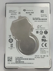 ST1000LM035, PN: 1RK172-285, SN: WDE48XPB, WU,FW: SDM1, Seagate 1Tb 2.5" HDD - Imagen 1 de 2