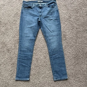 Pantalones de mezclilla elásticos azules ajustados Levi's 711 para mujer - W33 L30 - Imagen 1 de 7