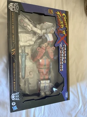 Transformers Street Fighter II x Optimus Prime Ryu vs Megatron M. Bison - Image 1 of 4