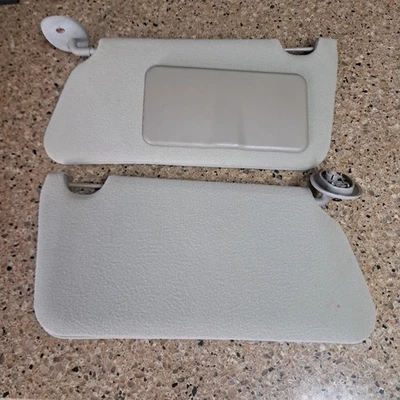 1999-2005 Pontiac Grand AM Sun Visors Gray Passenger Driver Side Pair Shades OEM - Image 1 of 2