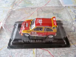 AUSTIN MG Métro 6 R4 n°7 Rallye des Garrigues Auriol IXO 1/43 en blister - Foto 1 di 2