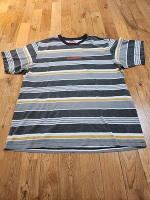 Camiseta Supreme a rayas negra y dorada grande para hombre Foto 1 de 4