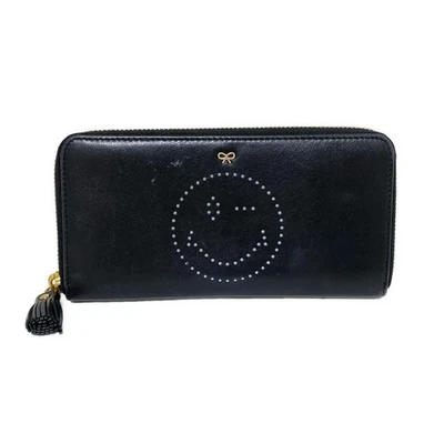 Auténtica billetera larga de cuero negra Anya Hindmarch Smiley Wink Foto 1 de 4