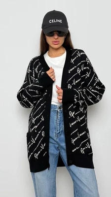 Cárdigan de lana con estampado de firma Versace GV en negro Foto 1 de 4