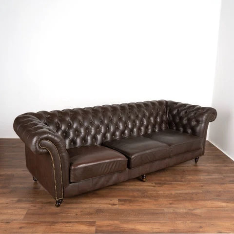 Vintage Brown Leather Three Seat Sofa on Castors from Denmark Cover