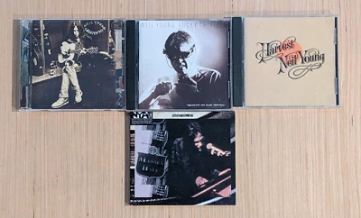 Neil Young 4 CD Lot Harvest/Lucky Thirteen/Live Massey Hall 1971/Greatest Hits - Image 1 of 3