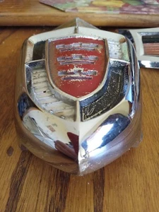 1956 Chrysler Windsor emblems, very nice condition part #1598602 & part #1624436 - Picture 1 of 10
