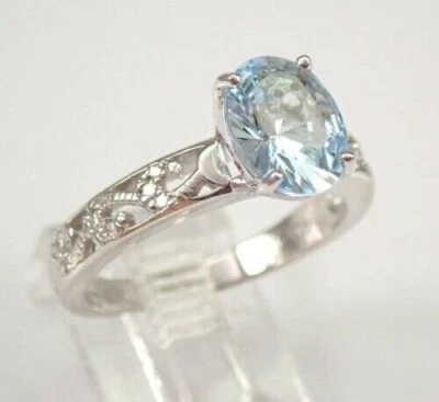 Anillo para mujer de diamantes aguamarina de corte ovalado creado en laboratorio de 2 quilates enchapado en oro blanco de 14 quilates Foto 1 de 4