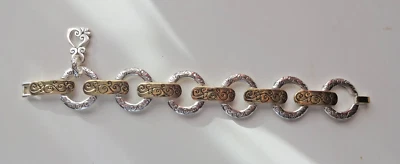 Pulseira unissex BRIGHTON coração dois tons prata e ouro design ornamentado robusto - Imagem 1 de 4