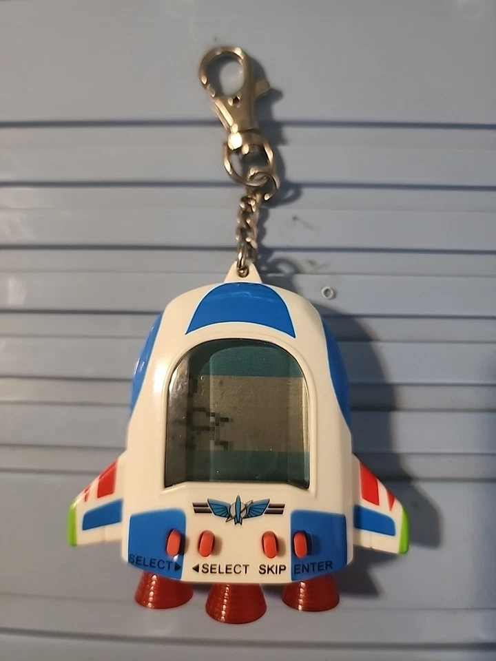 Thinkway Toys Disney’s Toy Story Virtual Pet Tamagotchi Buzz Lightyear FUNCIONA Foto 1 de 4