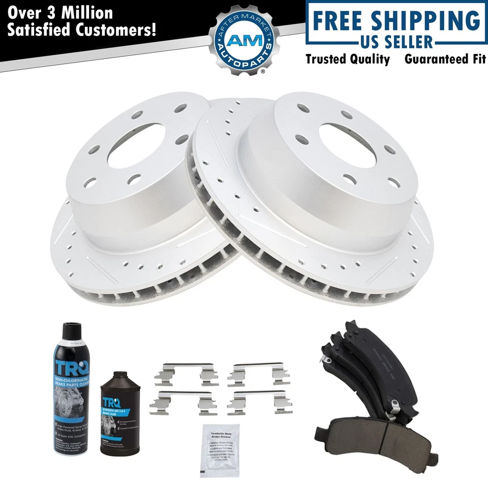 Kit trasero de rotor de freno y pastillas de cerámica Performance recubiertas en G con productos químicos Foto 1 de 4