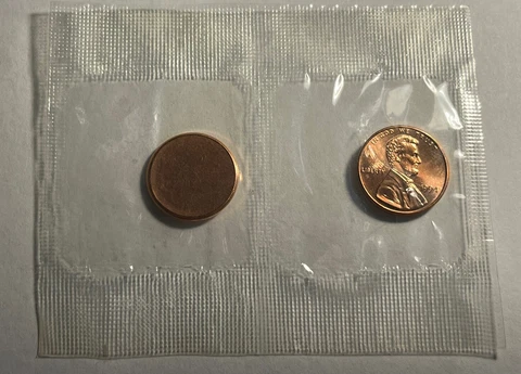 BLANK PLANCHET ERROR COIN AND 1994-P LINCOLN MEMORIAL CENT SET Cover