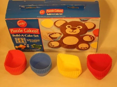 Wilton Puzzle Cakes! Build-a-Cake 24pc Retired 2007 Silicone Cupcake Cake Set - Image 1 of 4