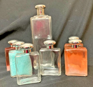 Lote de 7 frascos de botellas de tocador de vidrio vintage - Tapas atornillables de aspecto plateado - VACÍOS - Imagen 1 de 7