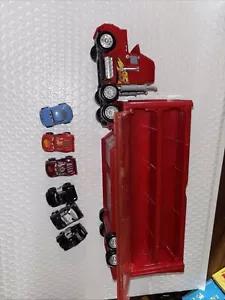 Mattel Disney y Pixar Cars Mack Mini Racers Hauler y 6 Mini Cars Doc, McQueen+ - Imagen 1 de 18