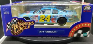Jeff Gordon #24 Peanuts Monte Carlo 1:24 Scale Diecast 2000 Winners Circle NIB - Picture 1 of 10
