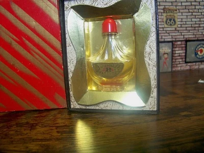 MINI BOTELLA DE PERFUME IRRESISTIBLE VINTAGE CON CAJA Foto 1 de 2