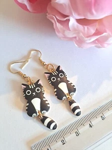 Ohrring kleine Katze Schwanz abnehmbar, schwarz-weiß, neu - Bild 1 von 4